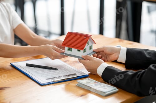Preview: Real estate agent delivering new houses to customers after purchase and make a loan agreement.
