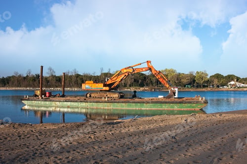 Preview: Excavator for channel dredge on a barge.