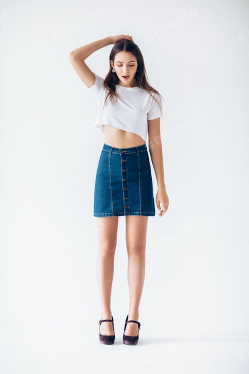 Preview: Woman in Crop Top and Denim Skirt