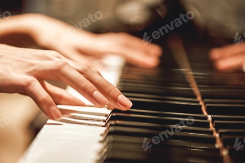 Preview: Beautiful Piano Melody...Close up view of female hands playing on piano her favorite classical music