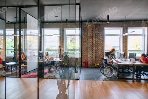 Preview: A diverse group of business professionals collaborates in a modern startup coworking center