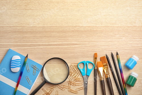 Preview: Different school stationery with space for design on wooden background, flat lay