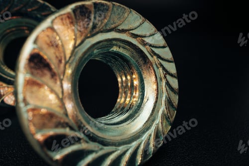 Preview: Metal nut on black background close up