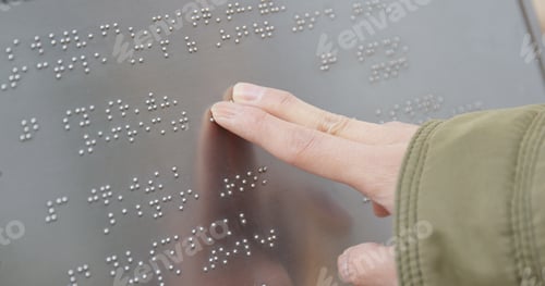 Preview: Blind reading on Braille at outdoor directory
