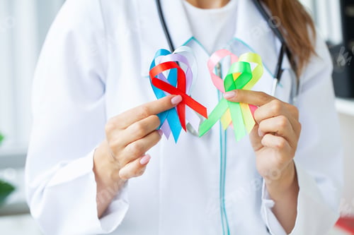 Preview: Female doctor holds colored ribbons symbolize awareness of various diseases