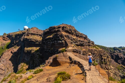 Preview: A young tourist on the trail to Pico do Arieiro from Ninho da Manta viewpoint, Madeira. Portugal