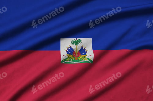 Preview: Haiti flag is depicted on a sports cloth fabric with many folds. Sport team waving banner