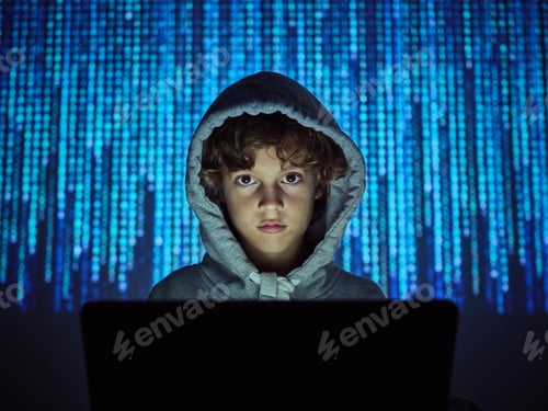 Preview: Hacker looking at camera at computer