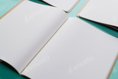 Preview: Close up of open books with copy space on green background
