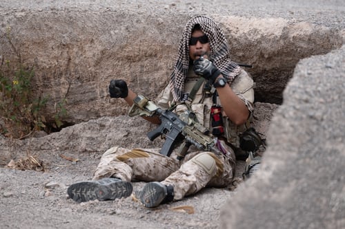 Preview: Soldiers in camouflage military uniforms carrying weapons Reconnaissance missions in rugged mountain