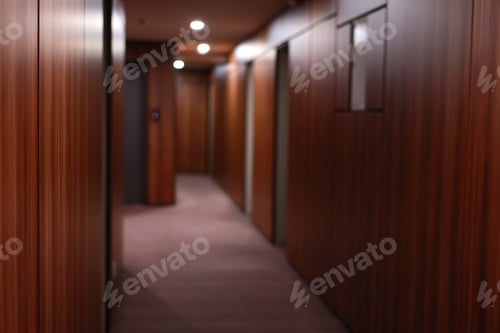 Preview: Empty dark interior of the modern Hotel corridor, with wood-paneled walls, elegant carpets