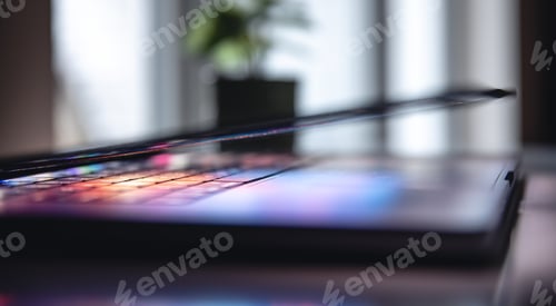 Preview: Close up of laptop keyboard colorful neon illumination, backlit keyboard.
