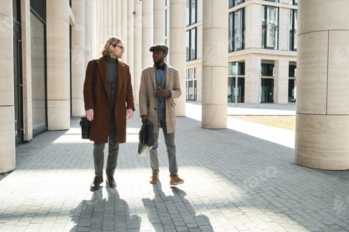 Preview: Two friends walking outdoors