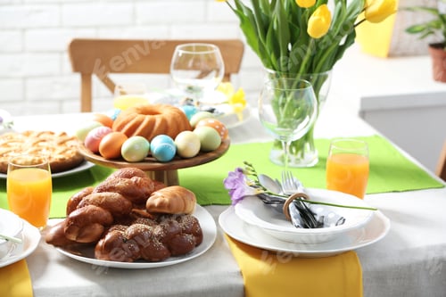 Preview: Festive Easter table setting with traditional meal at home