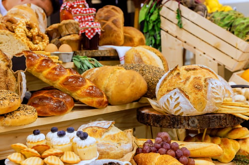 Preview: Assortment of fresh baked goods displayed at market in local farmers market
