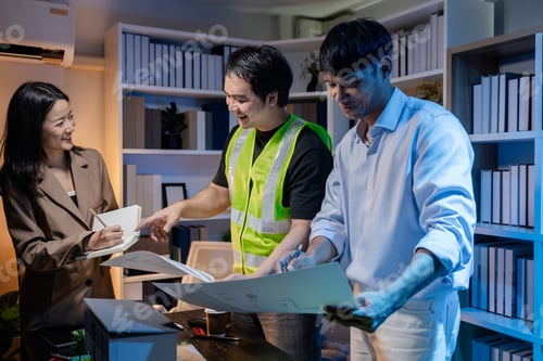 Preview: Architects and engineers work together in an office to review blueprints, exchange ideas
