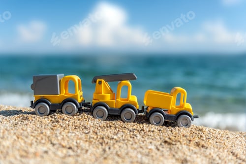 Preview: Children's toy car on the seashore