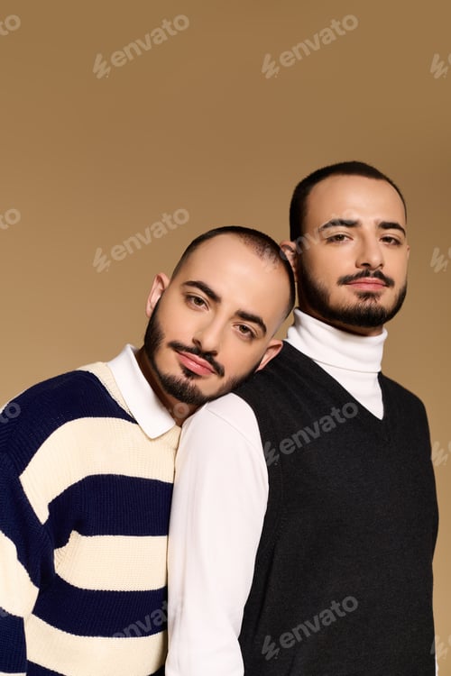 Preview: Twins showcase their stylish looks with confidence and charm in a warm setting