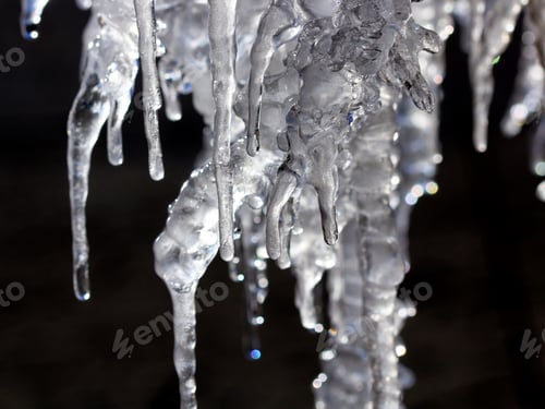 Preview: Icicles And Water Dripping - Photograph Of Icicles With Water Dripping From Edges And Reflections