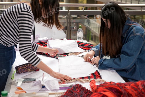Preview: Seamstresses creating garment
