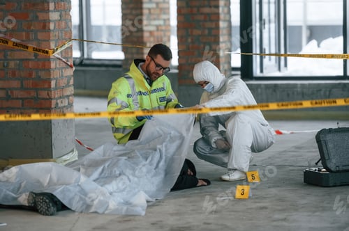 Preview: Dead body is on the ground. Detectives are collecting evidence in a crime scene