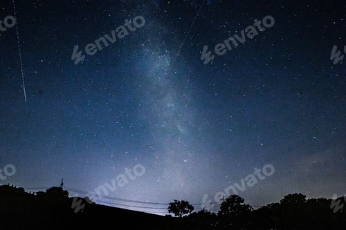 Preview: Low angle shot of a starry galaxy blue night sky