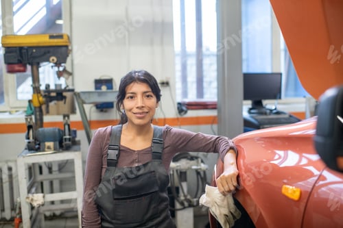 Preview: Portrait of Female Mechanic in Workshop