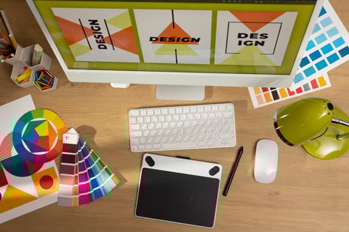 Creative professional designer's desk from above