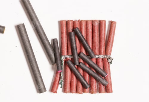 Preview: Firecrackers For New Year Holiday Lie On White Background