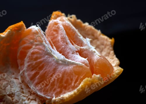 Preview: Peeled tangerine on a blue background