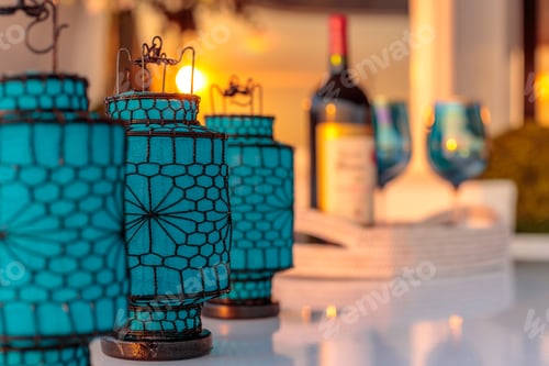 Preview: Closeup shot of blue lanterns with interesting textures on a blurred background