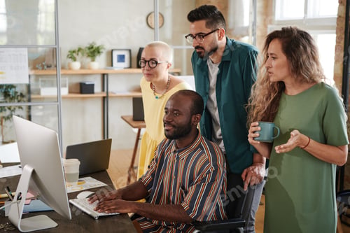 Preview: People working over presentation in team