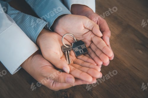 Preview: Holding house keys concept, house keys for new house, new house purchase