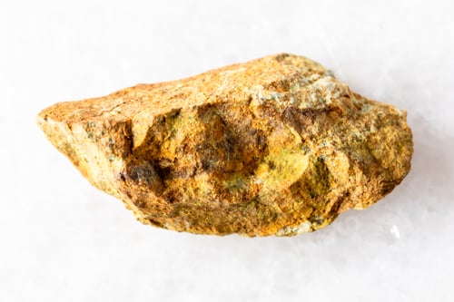 Preview: sample of raw beaverite-cu mineral on white marble