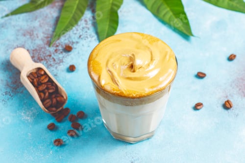 Preview: Dalgona coffee. Iced fluffy creamy whipped trend drink with coffee foam and milk.