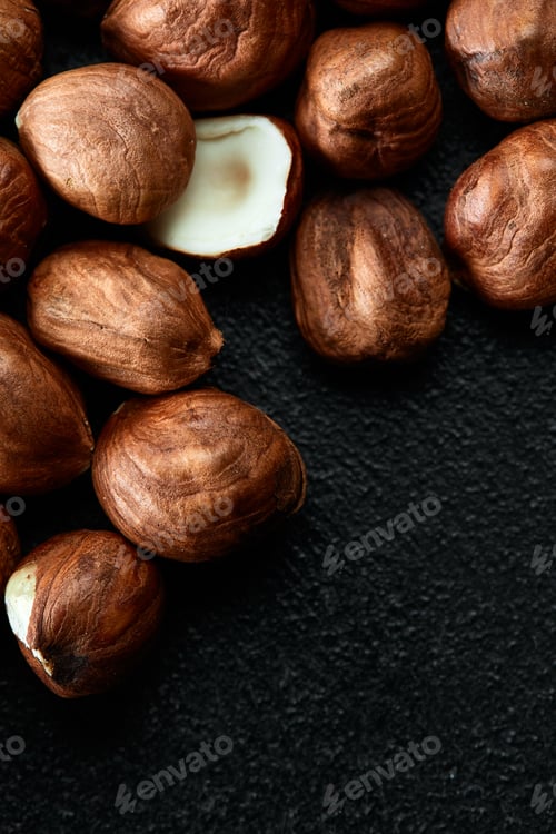 Preview: Close up of Hazelnut kernels - Food Frame Background, macro detailed close up.