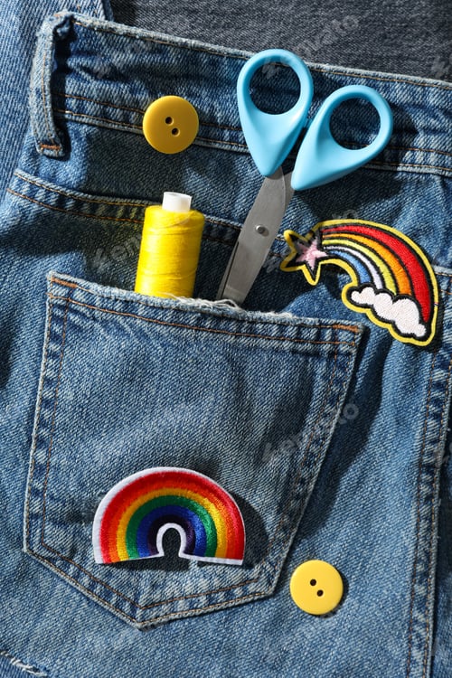 Preview: Denim clothes, decoration supplies and scissors, top view