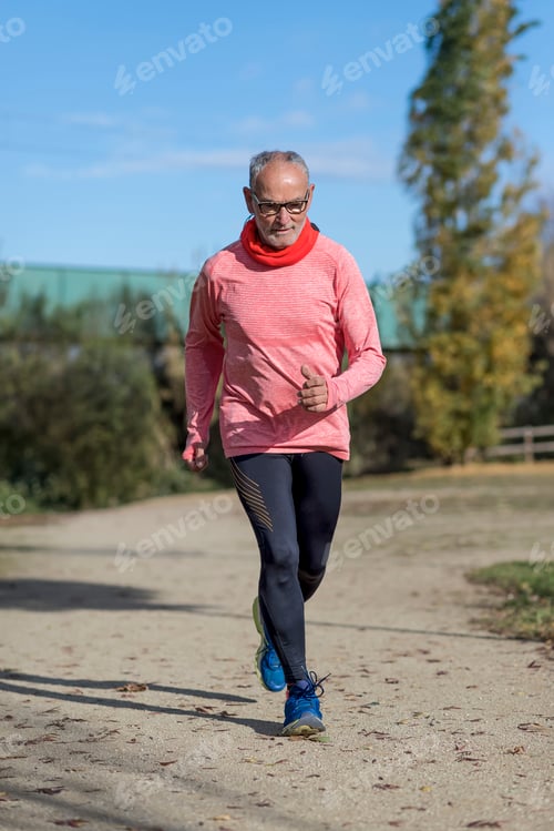 Preview: Senior retired man runs and performs exercise