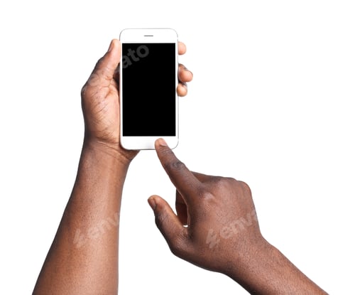 Preview: African-American man holding mobile phone with blank screen in hands on white background