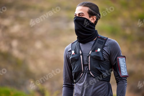 Preview: Man, runner and mask for fitness exercise, workout or trekking in the nature outdoors. Sporty male,