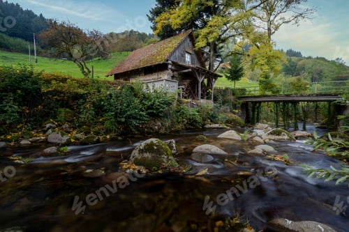 Preview: Low-angle view of a beautiful house near the lake
