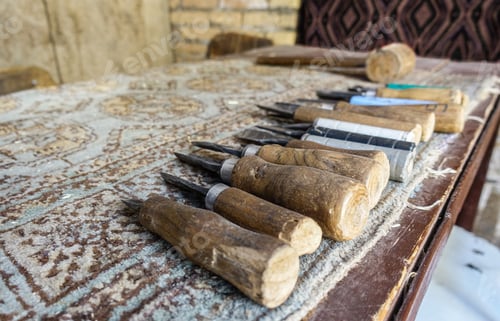 Preview: Several old gouges lined up on a rustic table