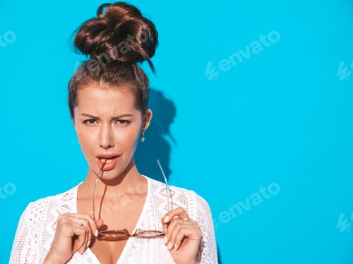 Preview: Portrait of young beautiful woman posing in studio