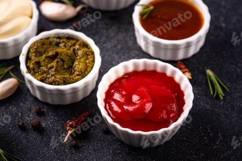 Preview: Set of different sauces. Ketchup, mustard, pesto