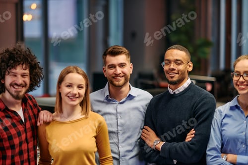 Preview: Smiling Coworkers Standing Together in a Modern Office