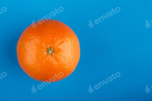 Preview: Ripe Mandarin Close-Up On A White Background. Tangerine Orange. Colorful Food And Drink Still Life