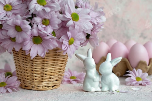 Preview: Basket of chrysanthemums, eggs and porcelain bunnies.