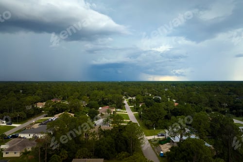 Preview: Landscape of dark ominous clouds forming on stormy sky during heavy thunderstorm