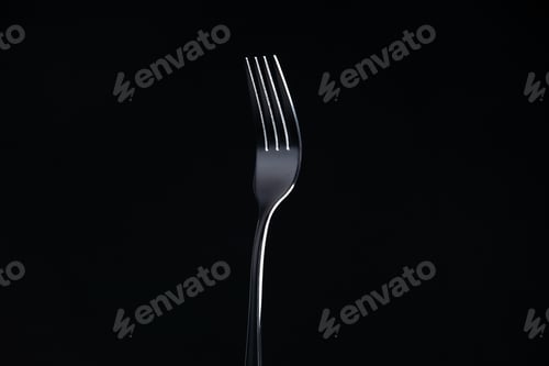 Preview: front view steel fork on black background free space