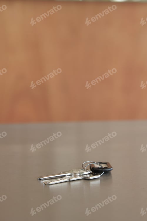 Preview: Keys resting on a smooth surface. lost home key concept
